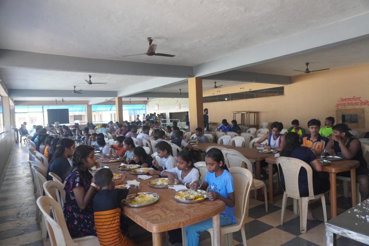 Guests enjoying buffet lunch at Maanas Resort Arnala dining pavilion